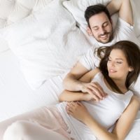 couple lying on bed