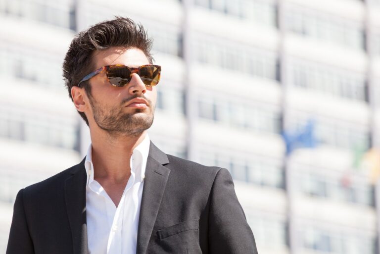 gorgeous stylish man wearing sunglasses