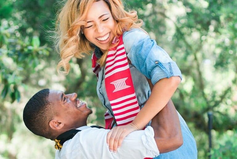 man lifting up his wife