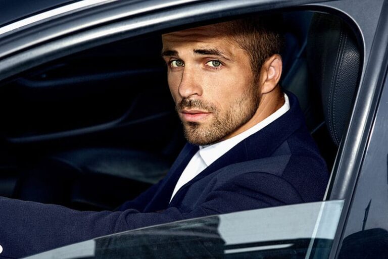 handsome man sitting in the car