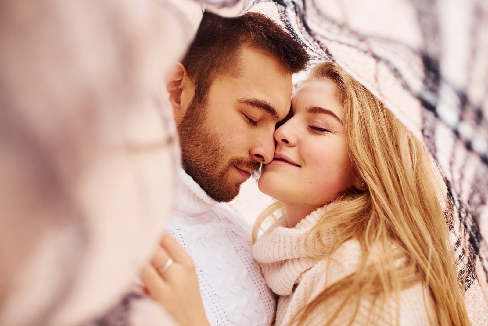 young beautiful couple cuddling