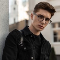 young man wearing glasses