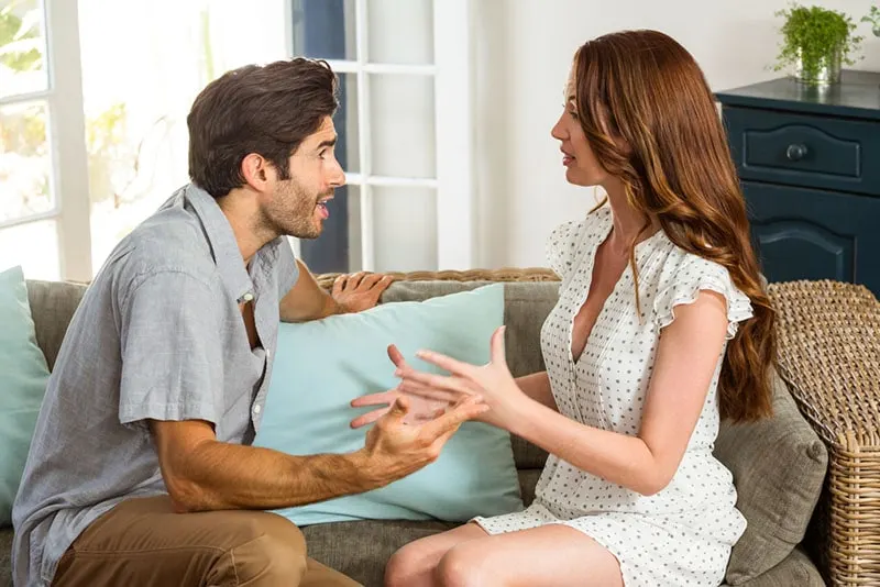 couple having conflict in the living room