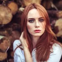 portrait of a serious red-haired girl