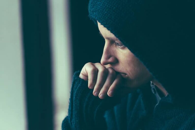 depressed man looking away