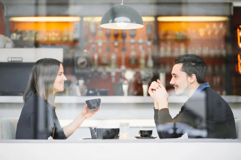 couple drinking coffee talking
