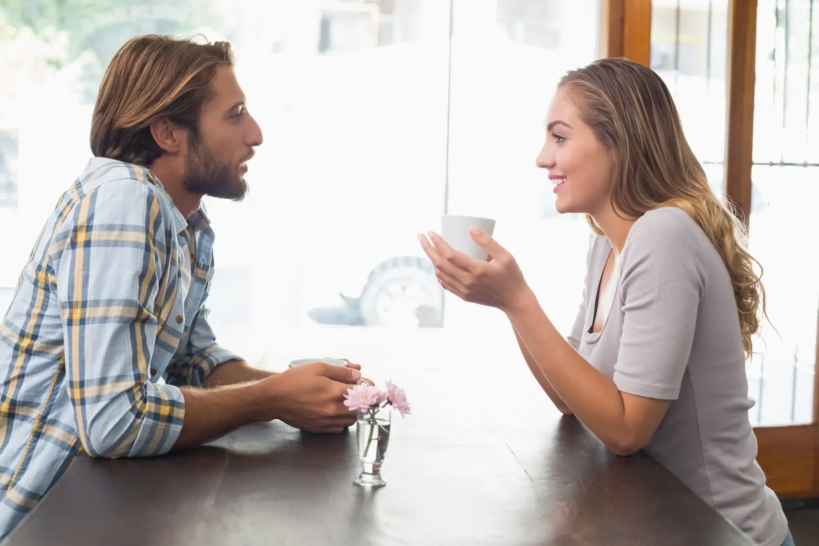 happy loving couple enjoys coffee and talks