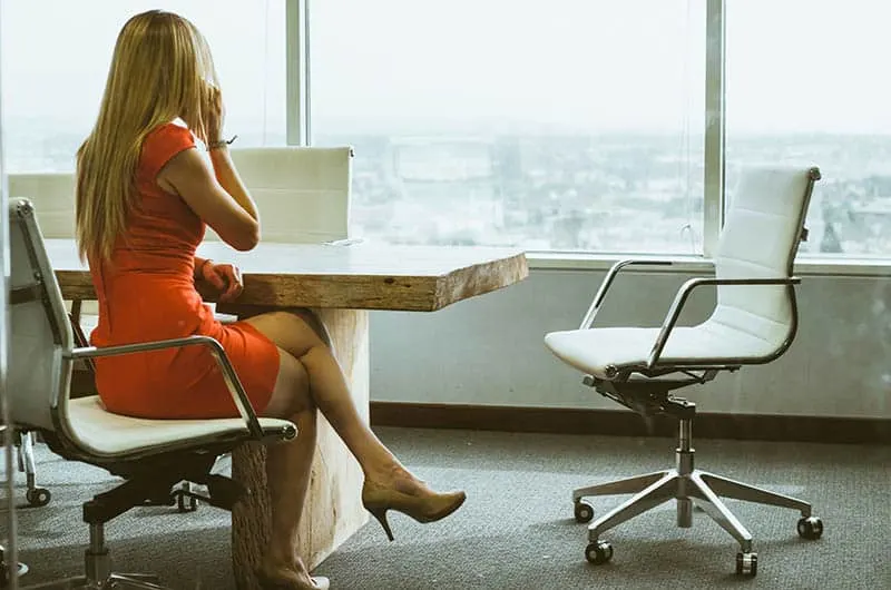 Lady Sitting On Stool Showing Off Her Ass