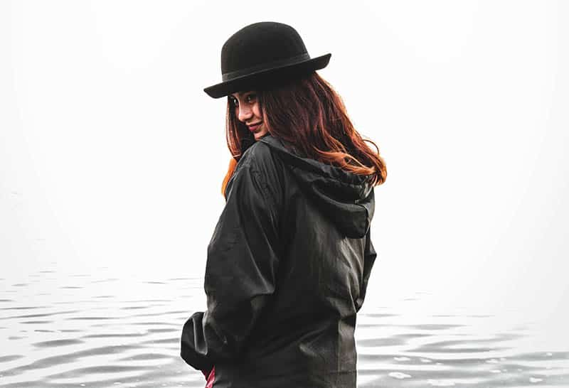 Woman smiling by the water