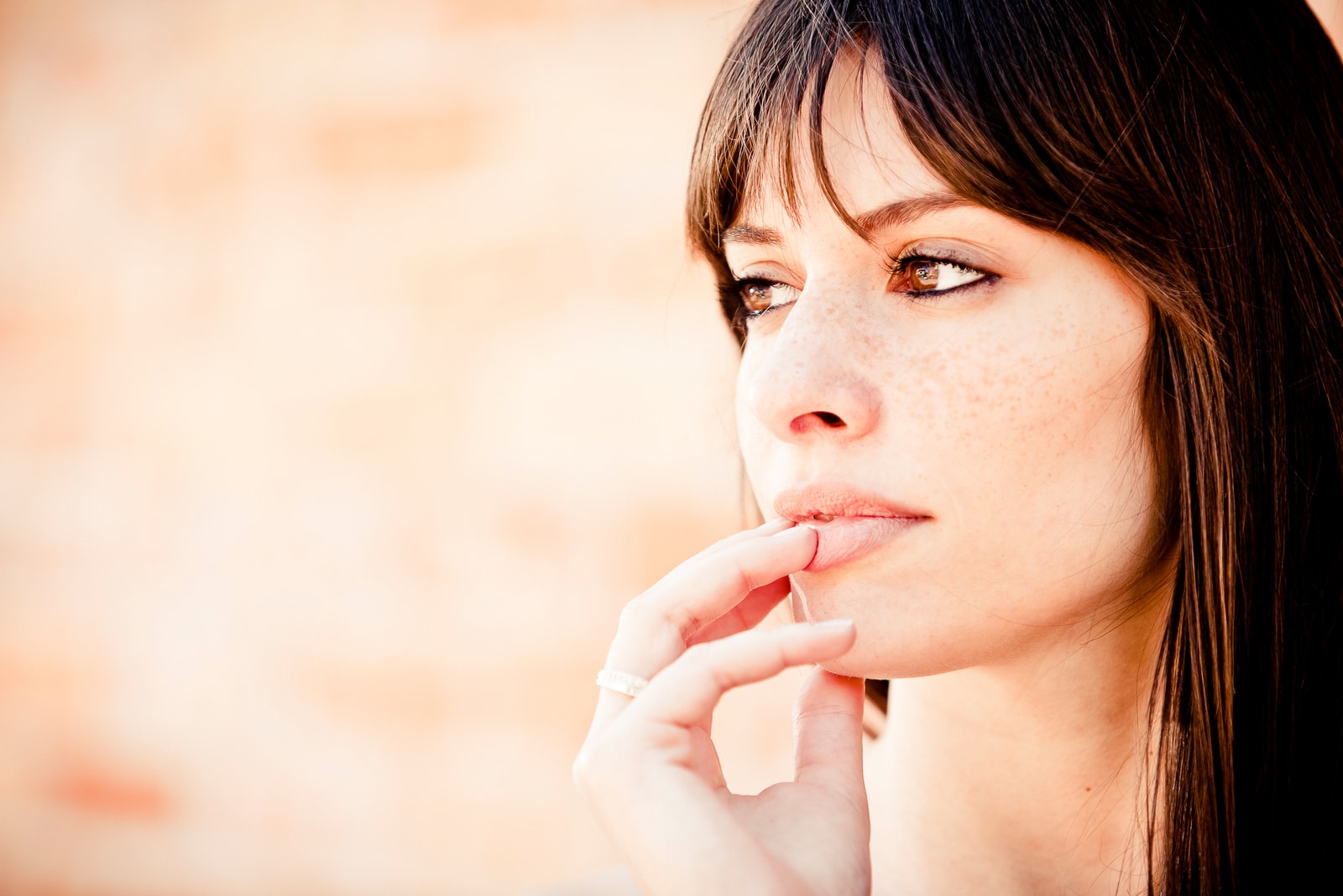 pensive woman looking away