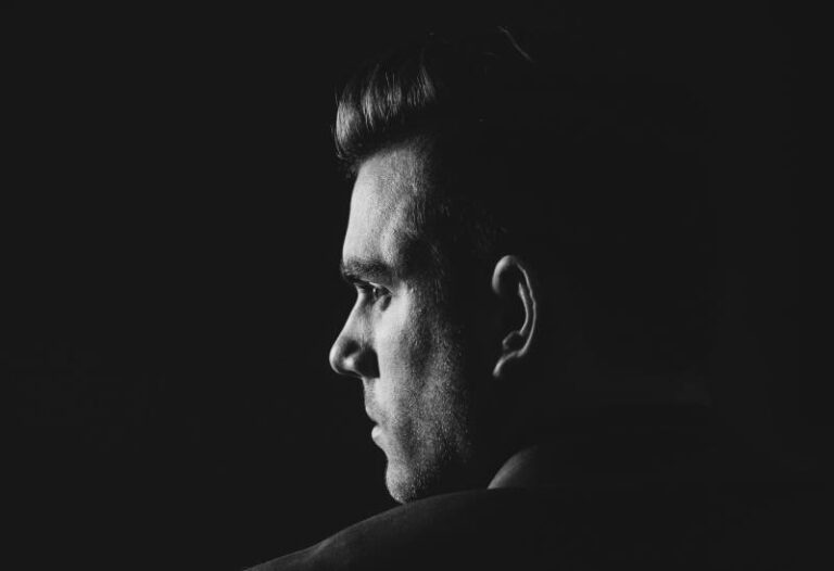 black and white photo of man looking right
