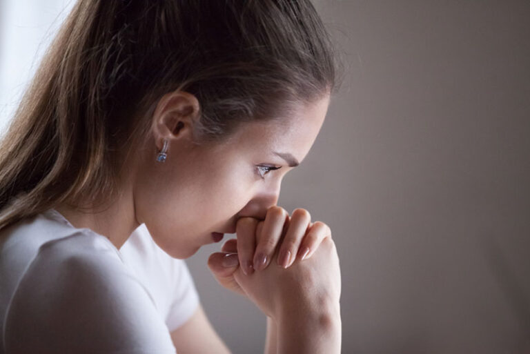 worried woman in thoughts
