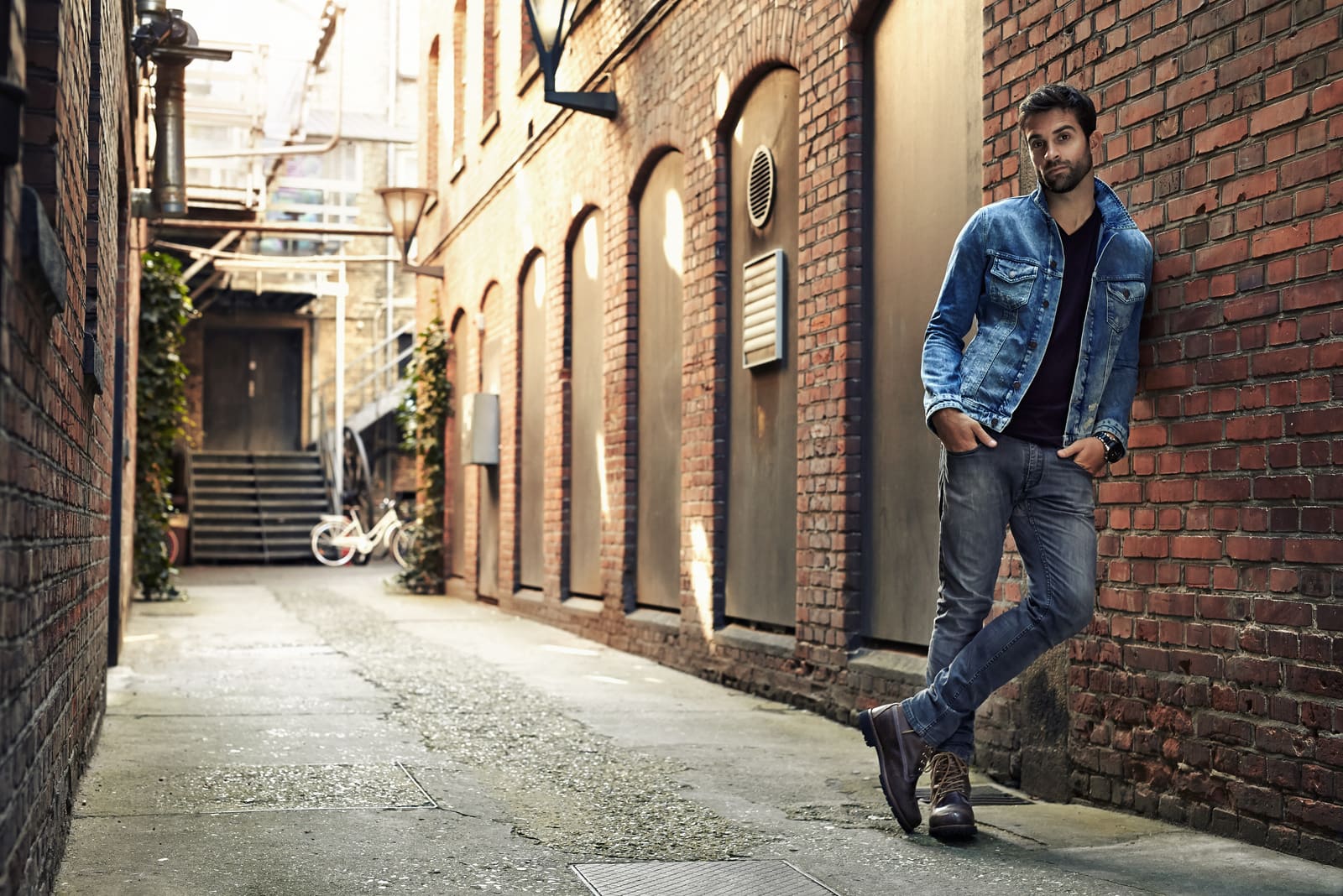 attractive man standing on the street