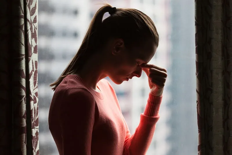 worried woman having a headache