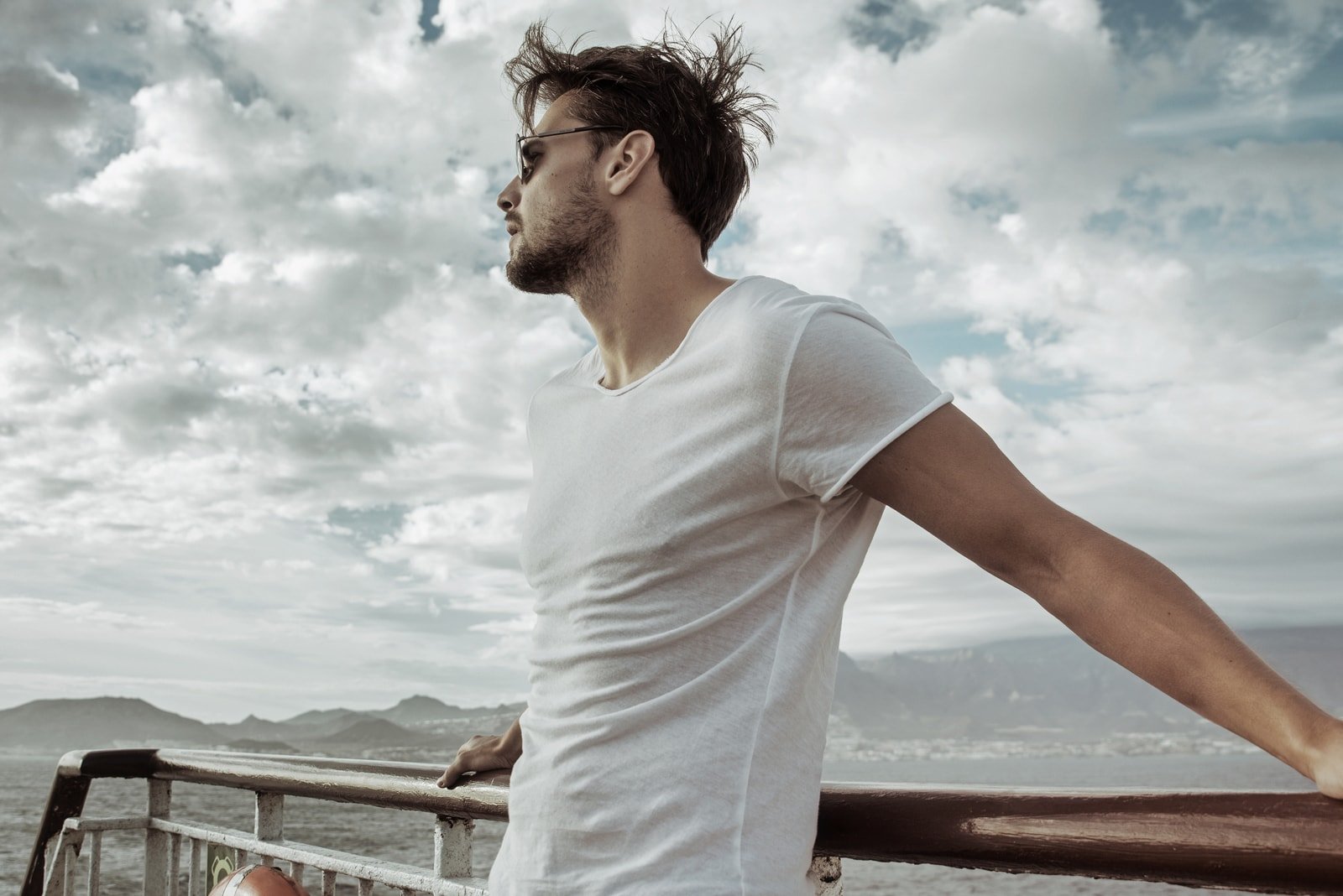 young man wearing white t shirt