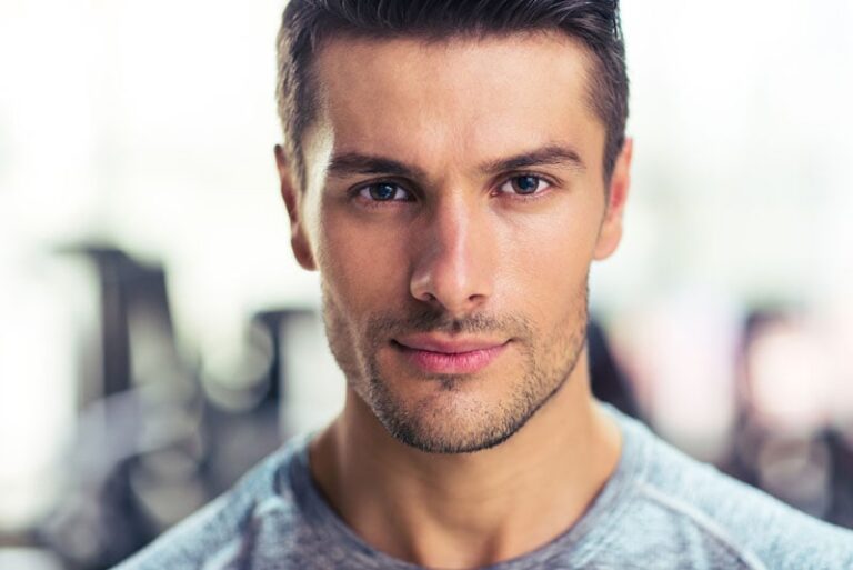 serious young man posing