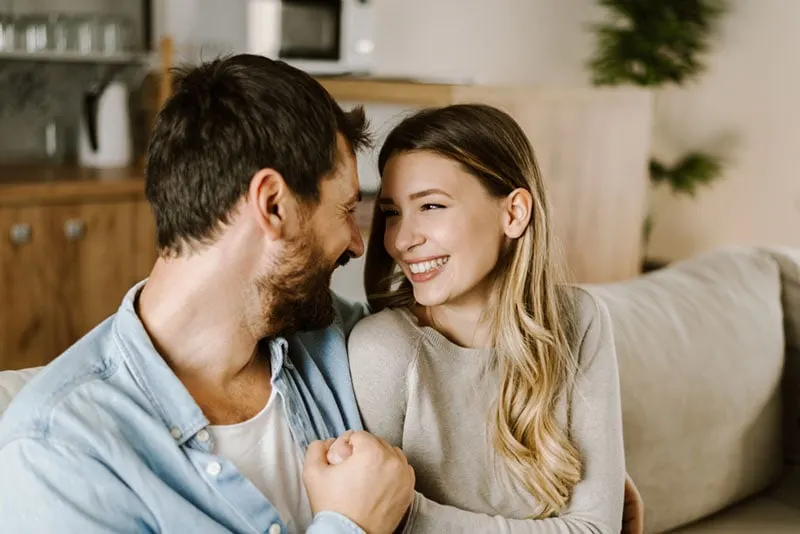 couple in love smiling to each other