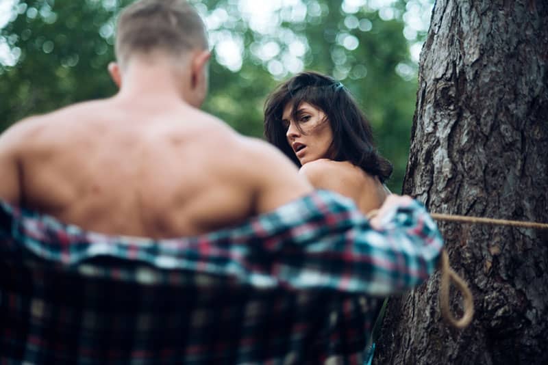 passionate couple standing outside