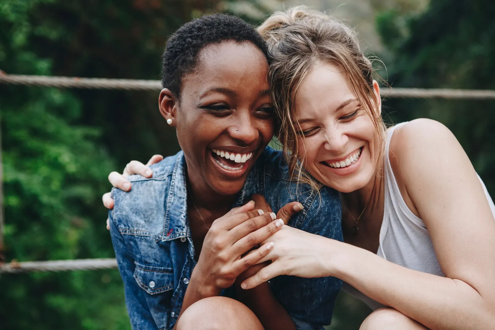 smiling friends hug
