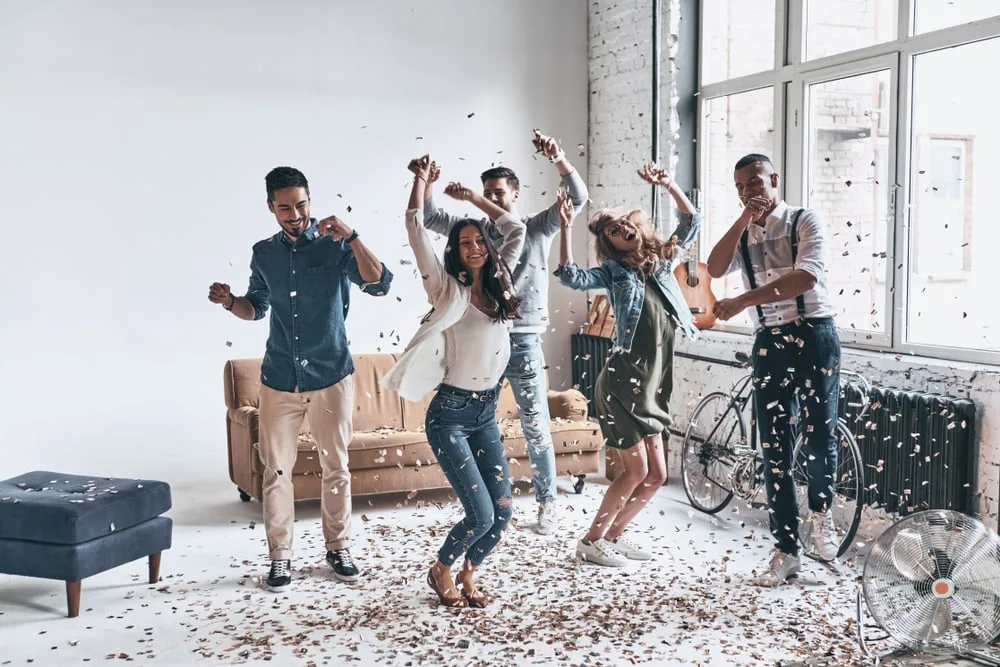 woman dancing with friends