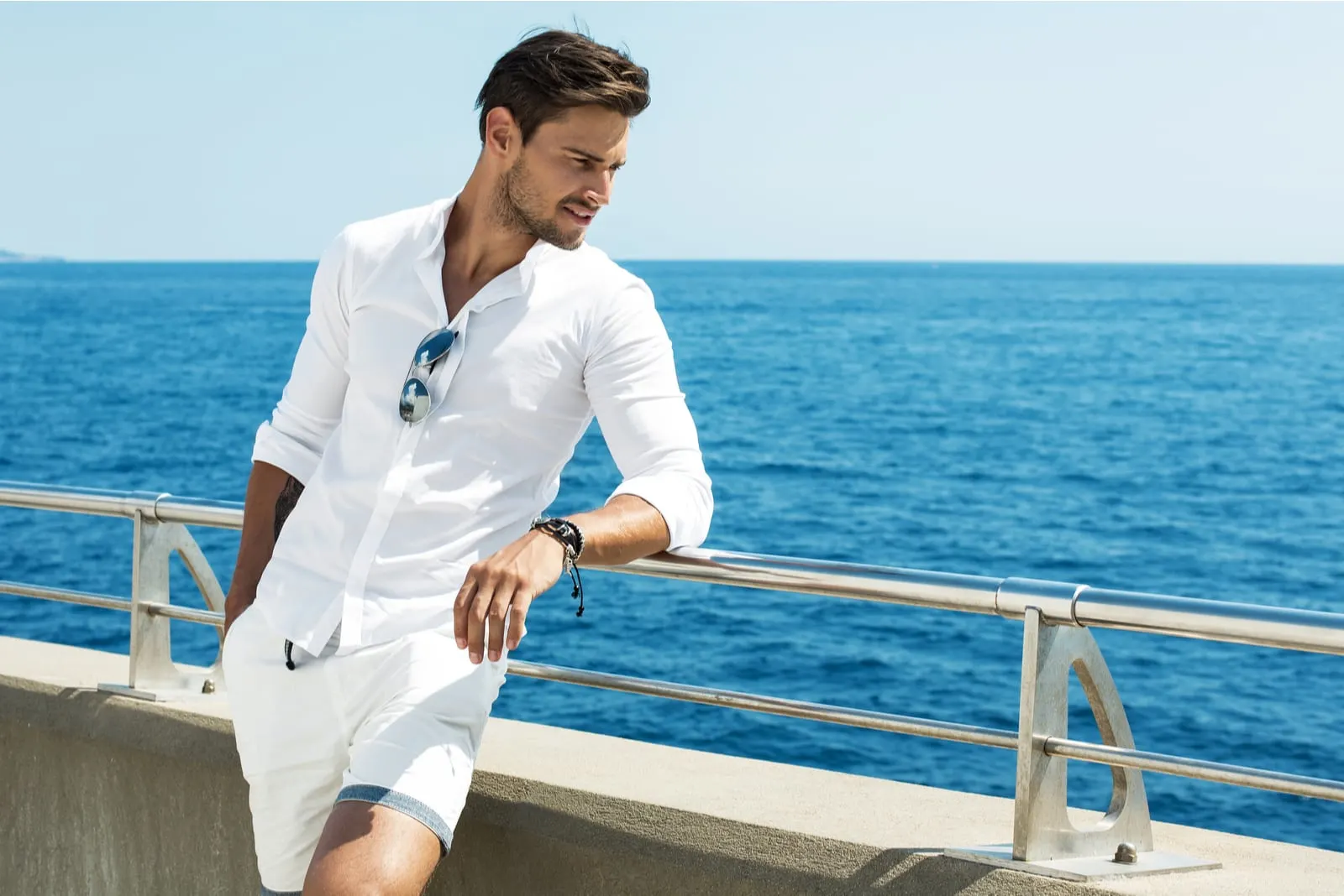 Handsome man wearing white clothes