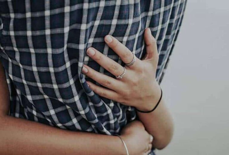 close up photo of woman hugging man