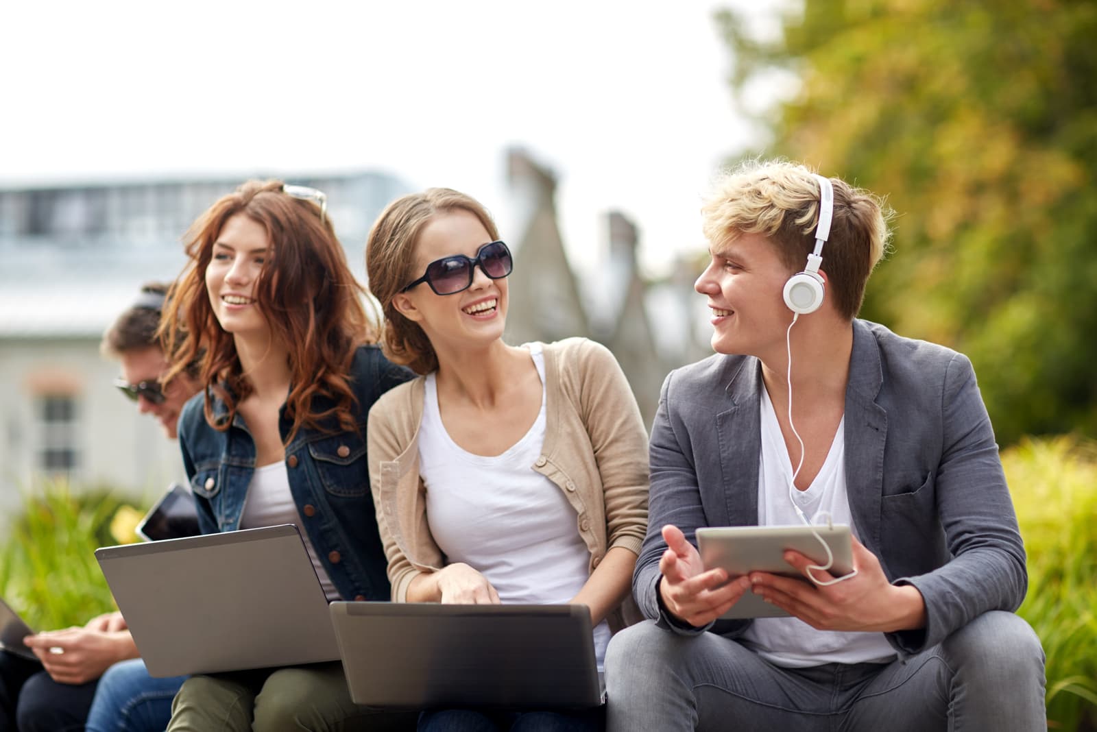 friends sit outside and have fun