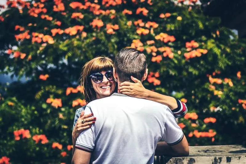happy woman hugging her man