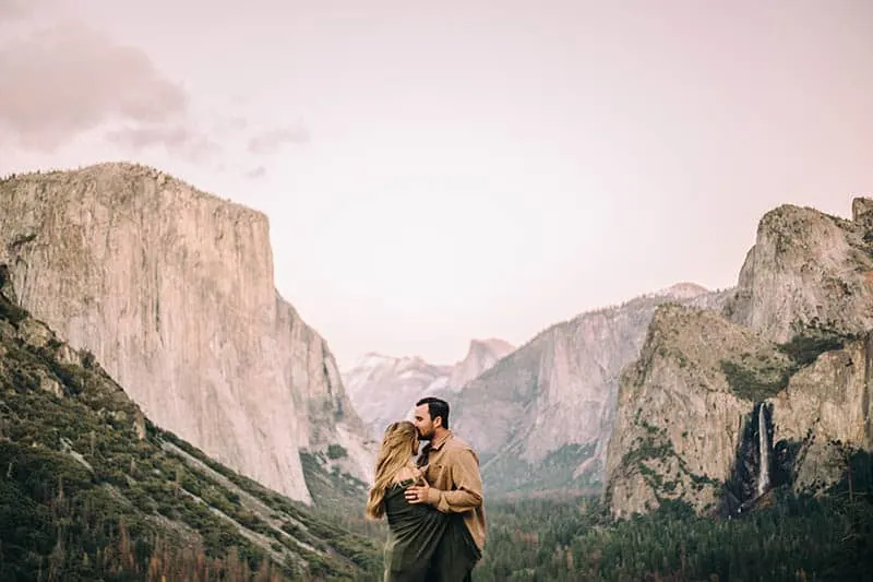 Couple hugging in mountains