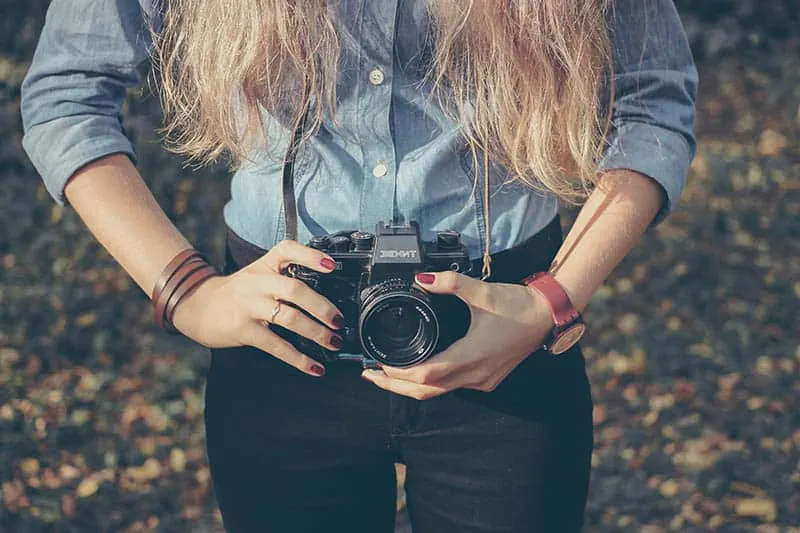 Woman holding a camera