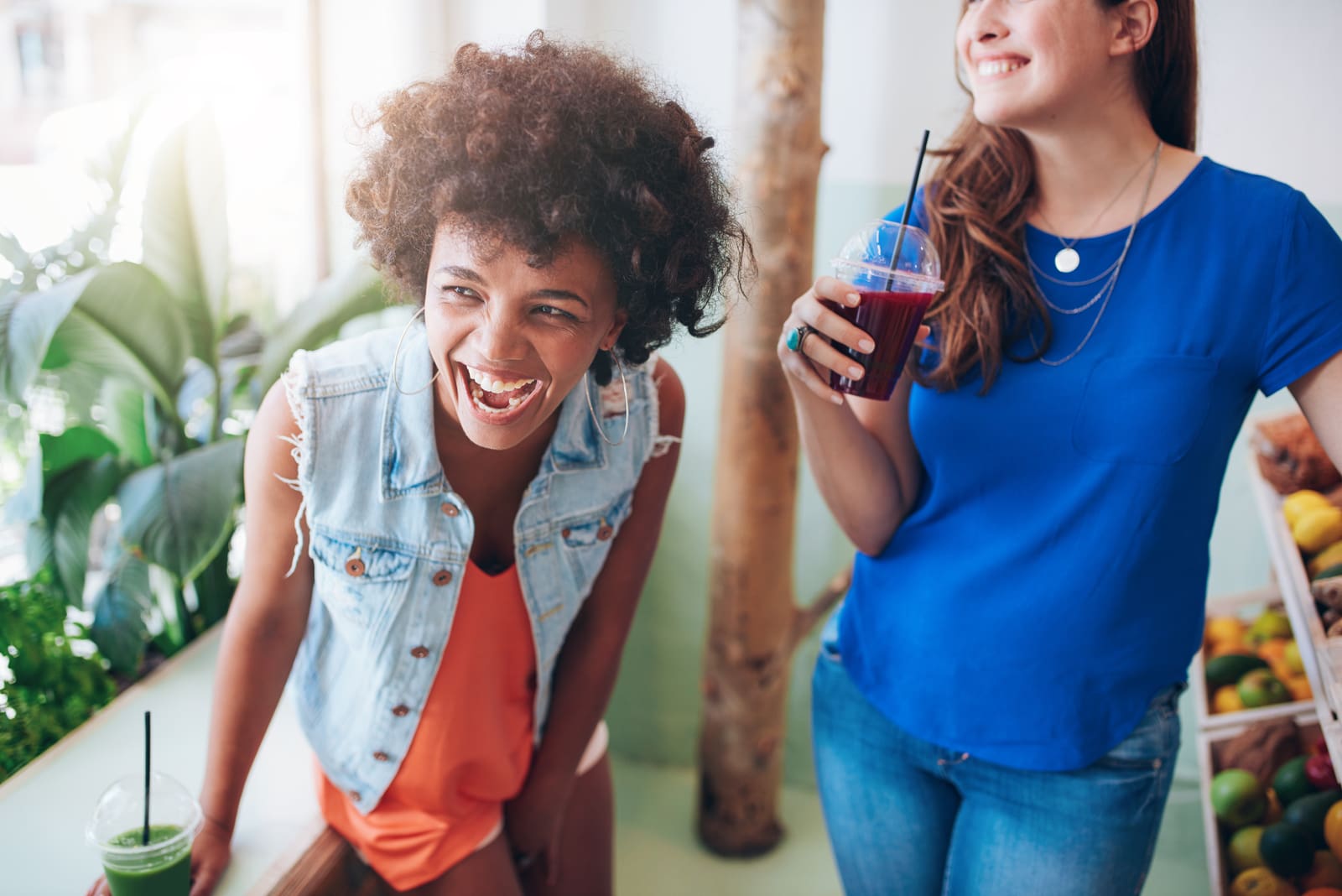 smiling friends drink smoothies