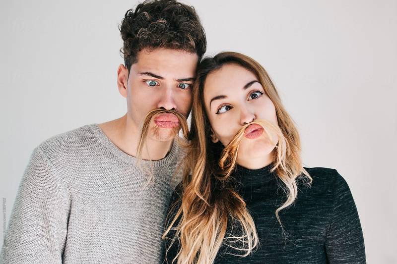 weird couple making duckface
