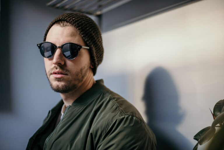 Young Serious Trendy Guy with sunglasses