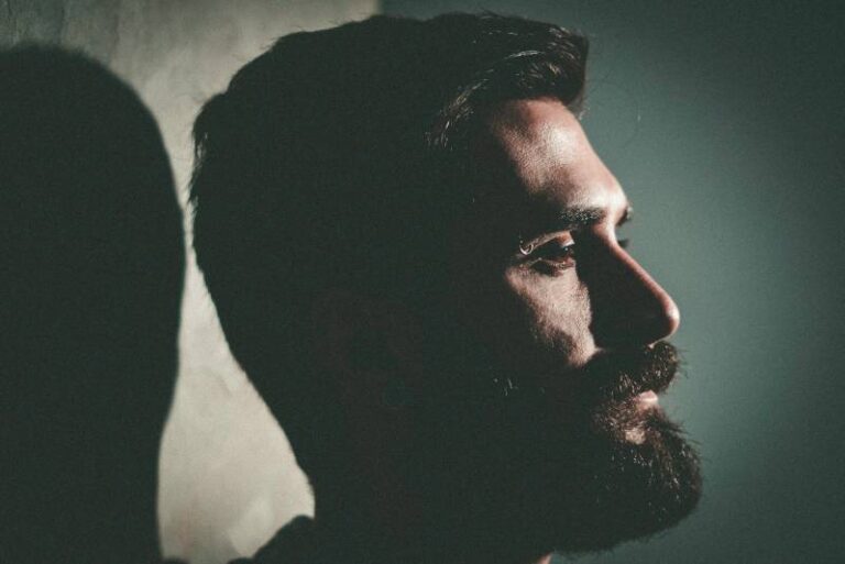 close up photo of man with beard