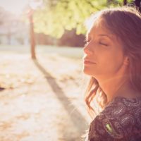 beautiful woman sitting in the park