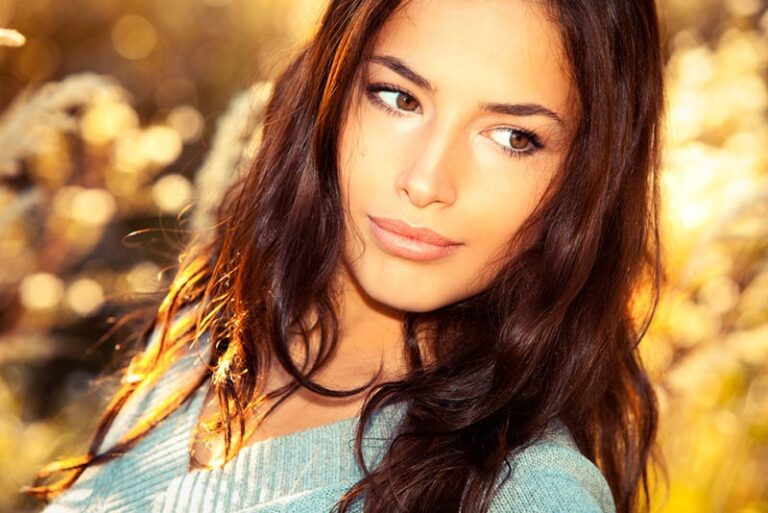 attractive young woman looking at distance