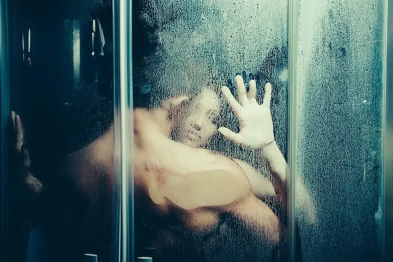lovers showering together
