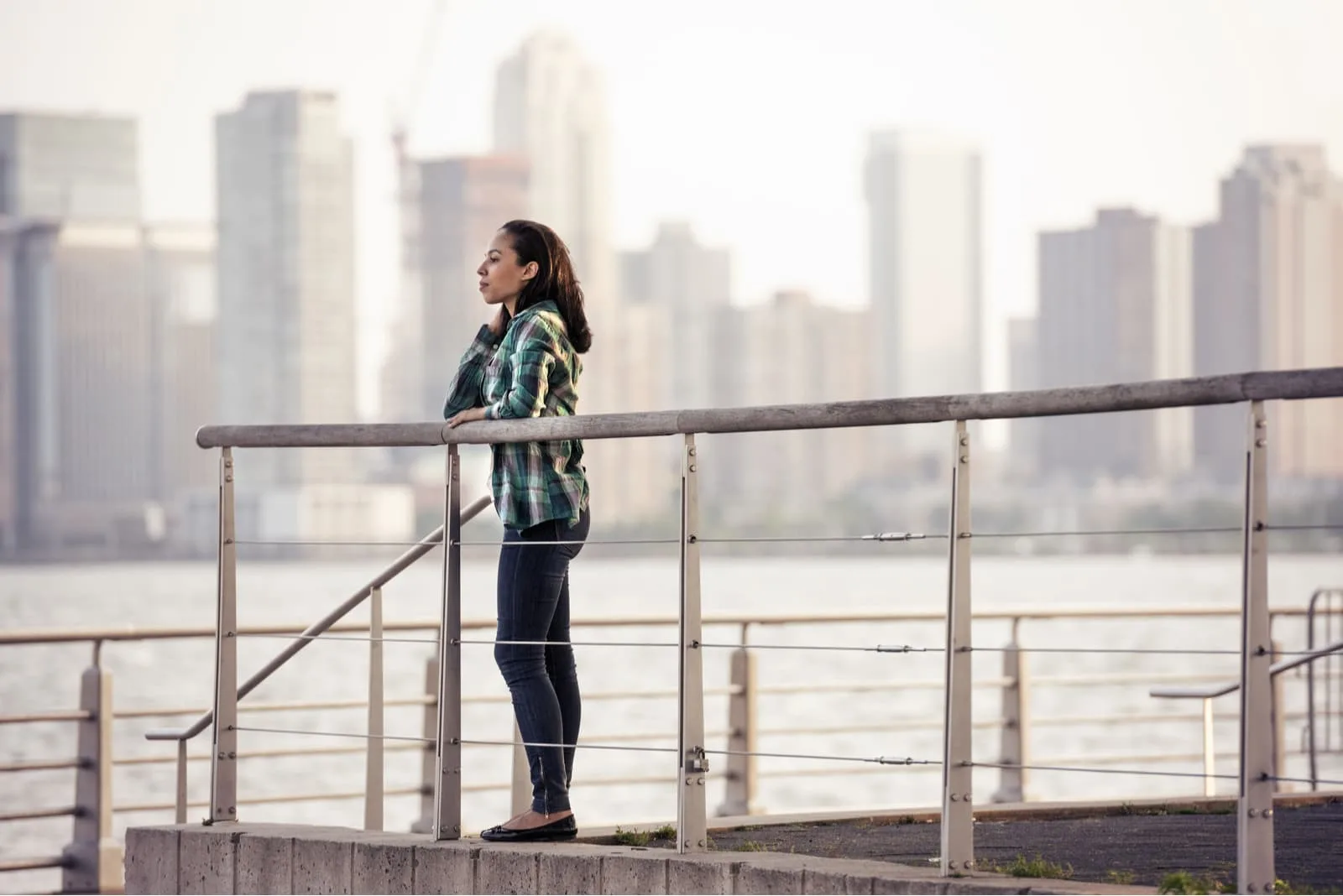 woman standing on the waterfront