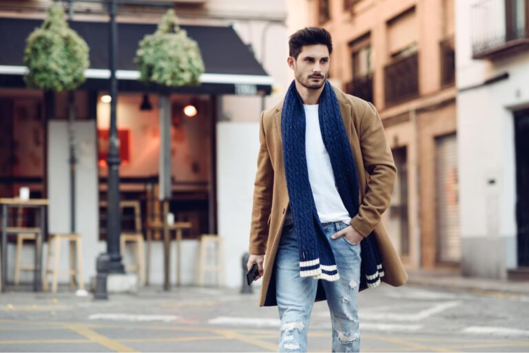 an attractive man walking down the street