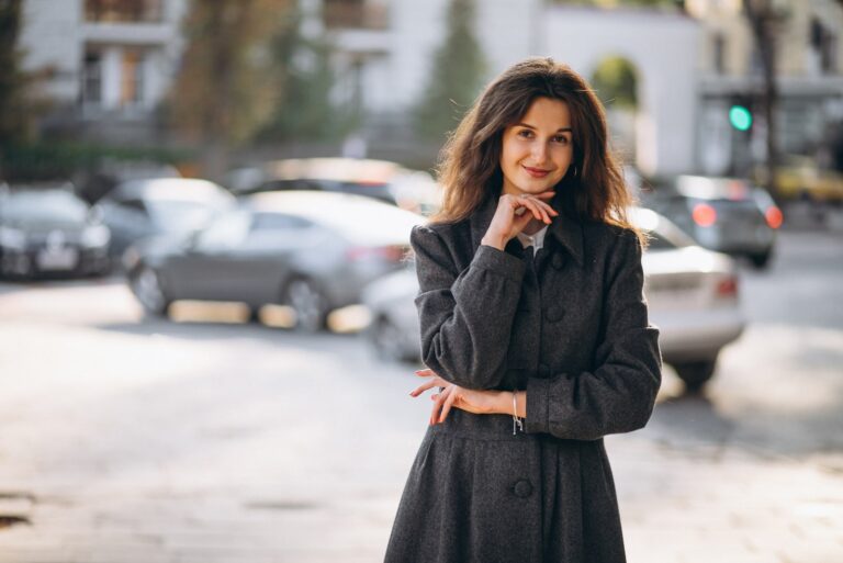 a woman standing in the street