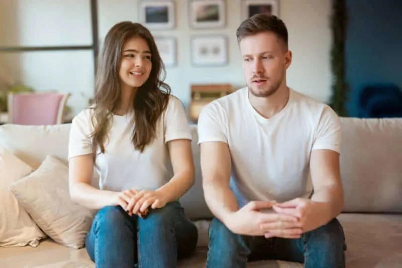 couple man and woman sitting on the sofa