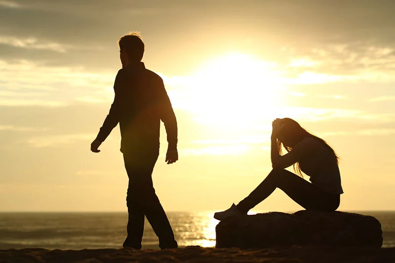 man leaving a woman