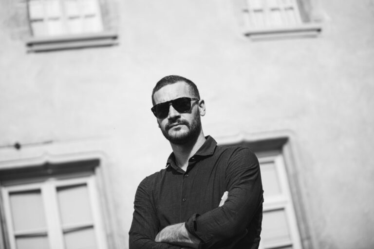 portrait of man in sunglasses outside