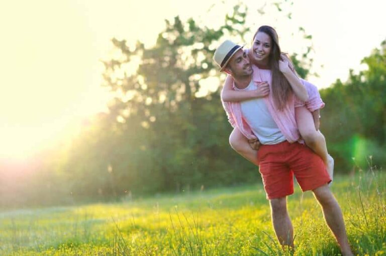 young couple having fun in nature