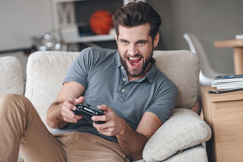 man playing video games