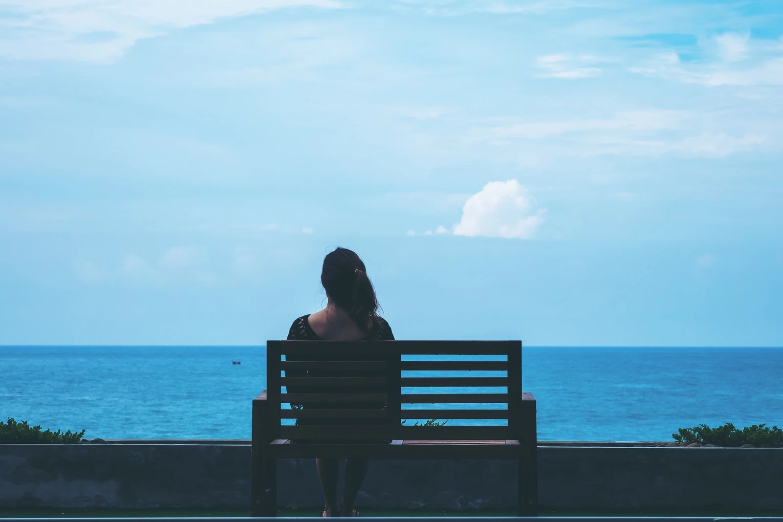 woman sitting on the bench alone
