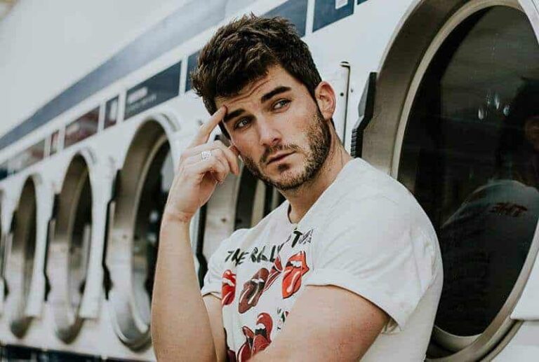 thoughtful man in laundry room