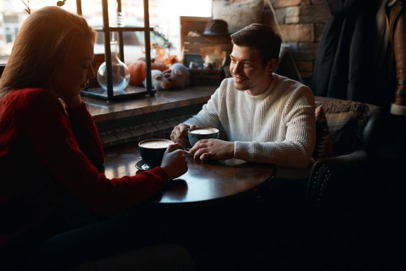 man and woman meeting in the bar