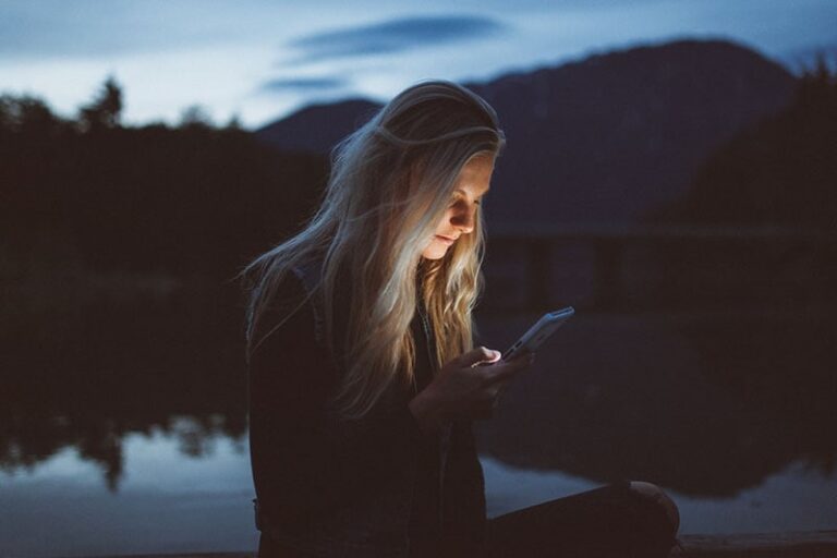serious woman texting