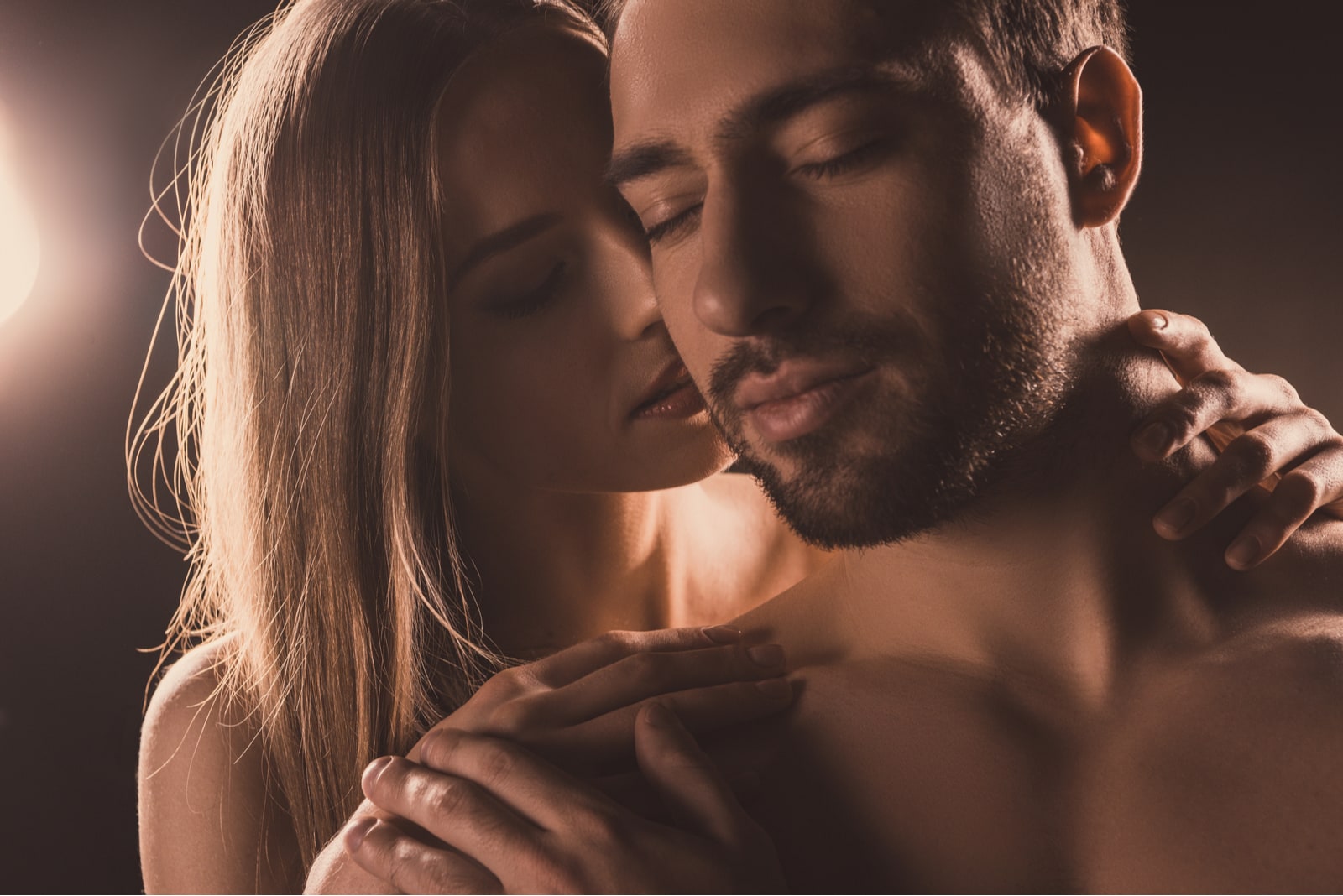 the woman hugged the man